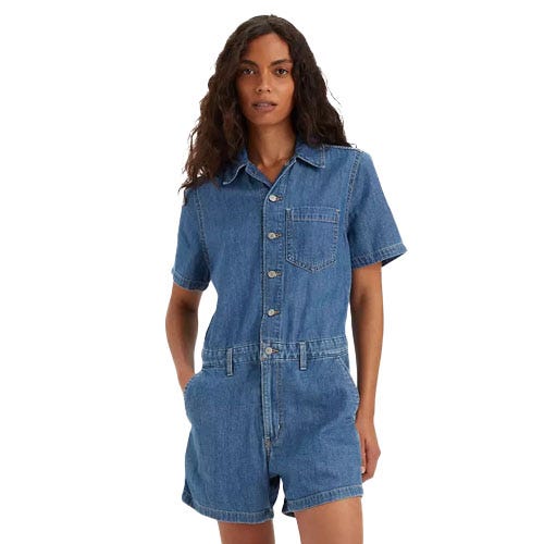 Levi's Short Sleeve Romper is a denim one-piece with short sleeves, a single chest pocket, button-up front, and short legs, designed with a casual fit and belt loops for a relaxed look.