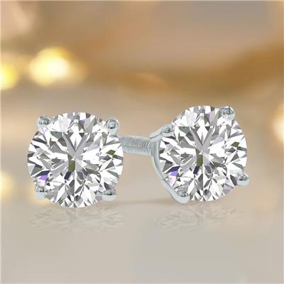 A pair of round-cut, 1.25-carat lab-grown diamond studs set in a four-prong, silver-toned metal.