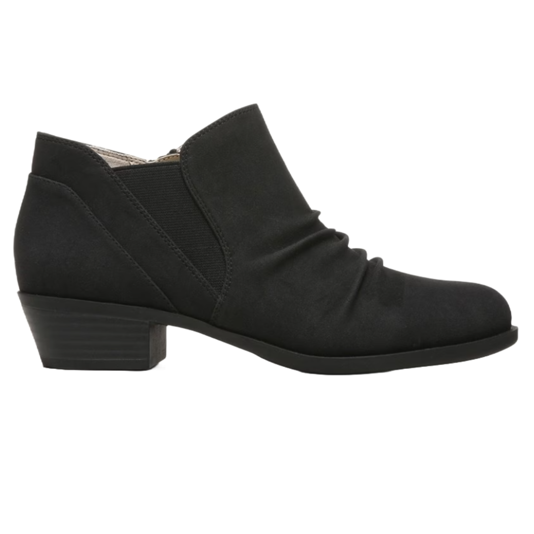 LifeStride Aurora Shooties are black ankle boots featuring a low block heel, side elastic panel, and pleated detailing. They're designed for comfort and a sleek, stylish look.