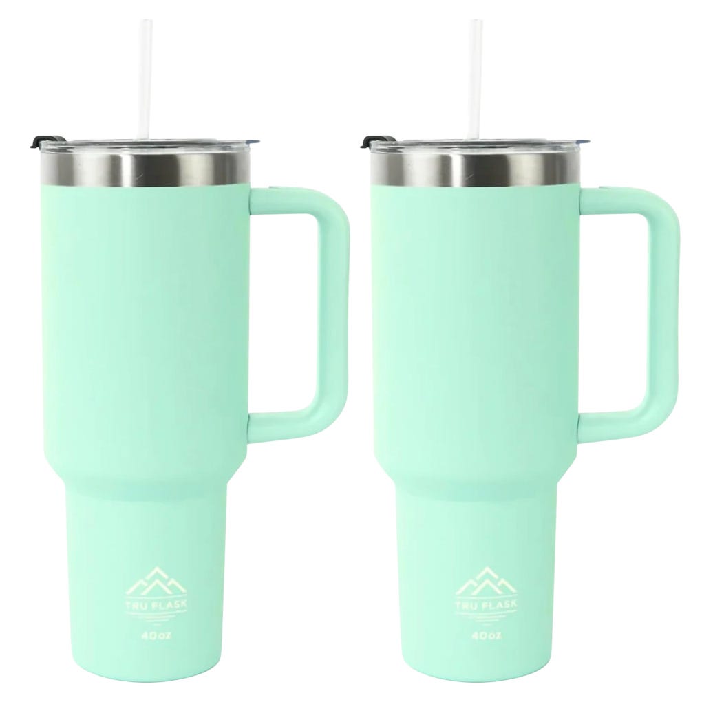 Two light teal-colored insulated tumblers with handles and transparent lids, each holding 40 oz, featuring metallic accents and equipped with straws.