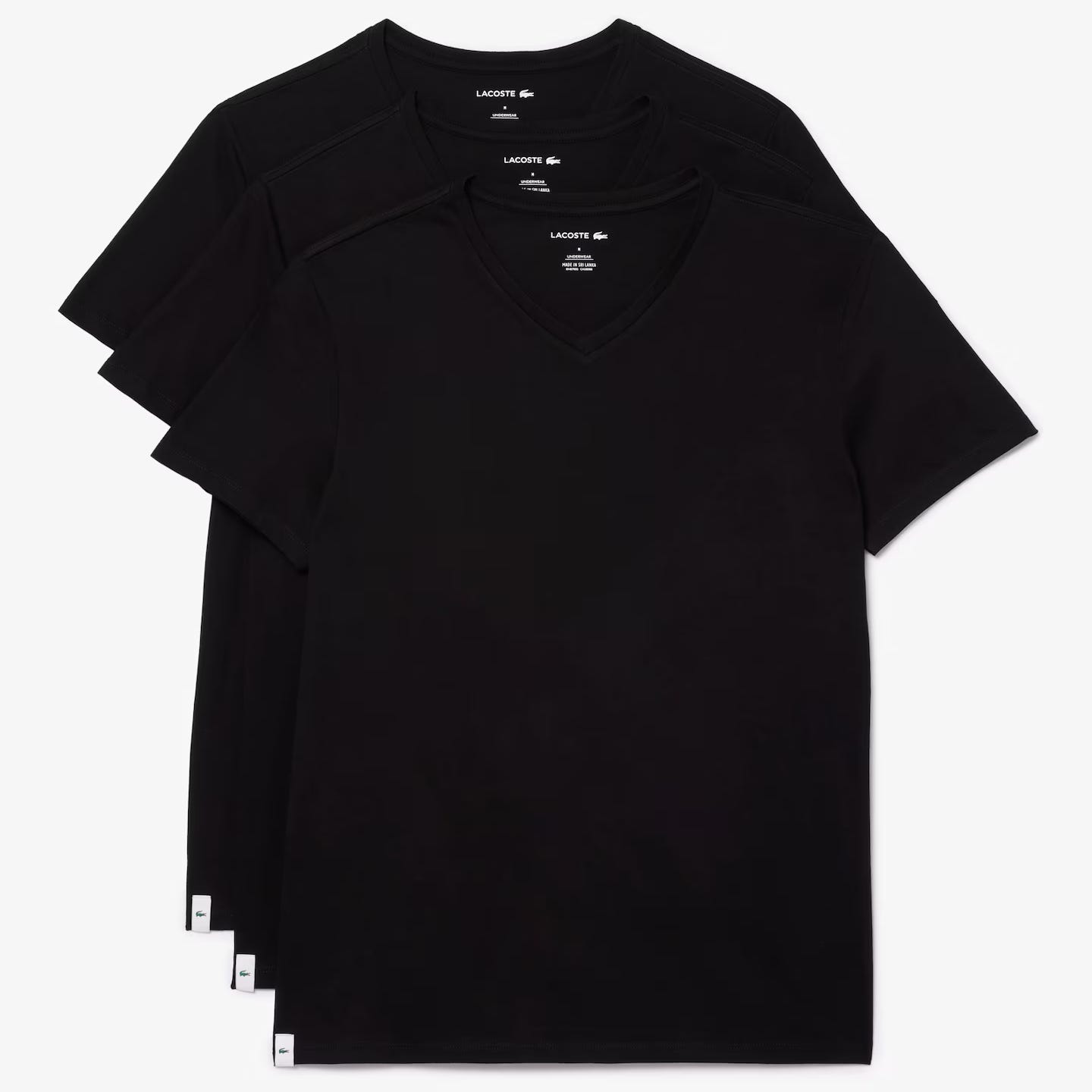 Three black V-neck T-shirts with a visible brand logo on the chest, stacked on top of each other.