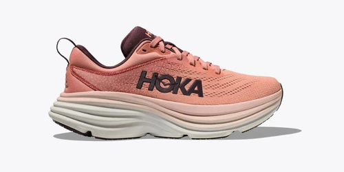 A single pink Hoka running shoe with a thick white sole.