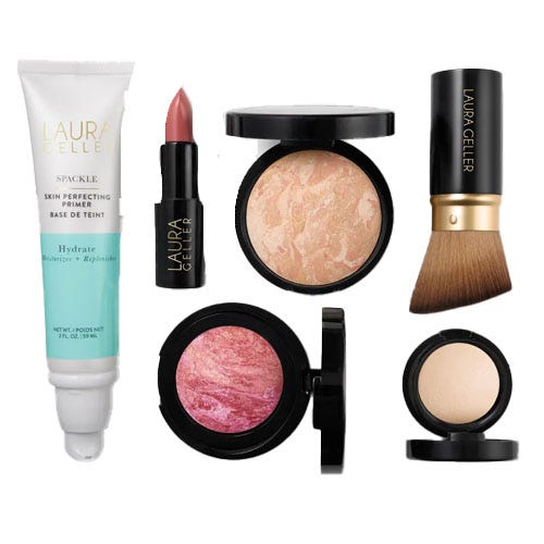 A collection of Laura Geller makeup featuring a skin-perfecting primer, lipstick, baked powder, blush, foundation, and a makeup brush.