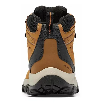 Tan and black Columbia hiking boots featuring a high-top design and reinforced heel with pull loop.