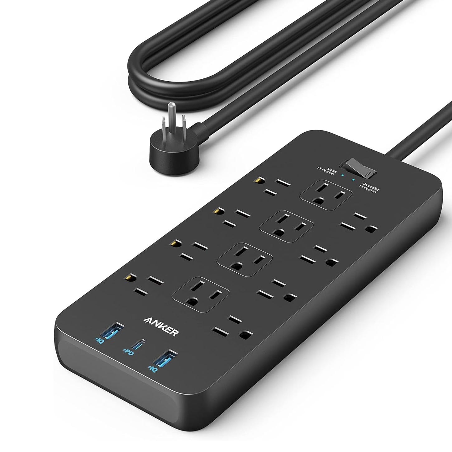 A black Anker power strip with six AC outlets and three USB ports, including two USB-A and one USB-C, designed for surge and grounded protection.