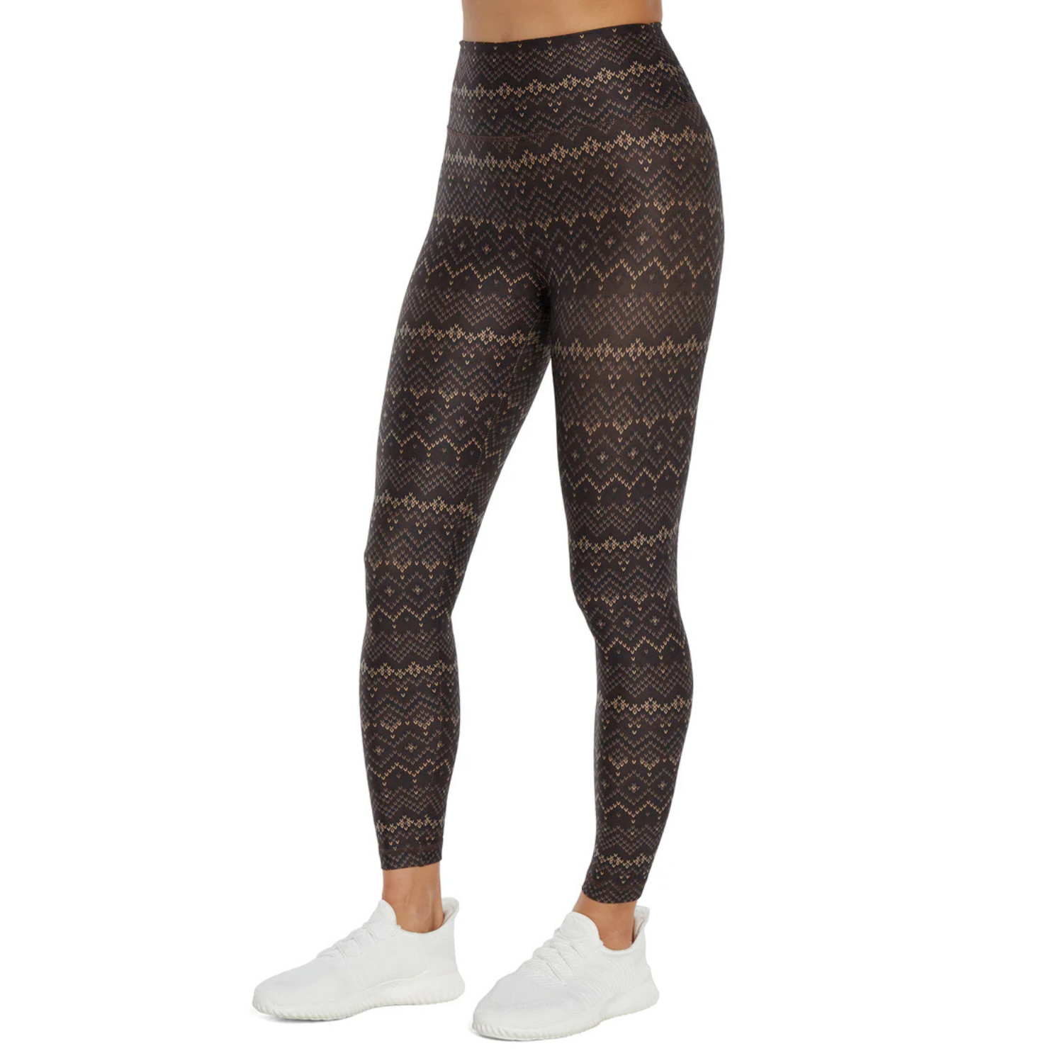 High-waisted leggings with a black, intricate zig-zag pattern, paired with white sneakers. The design includes horizontal geometric lines for a stylish look.