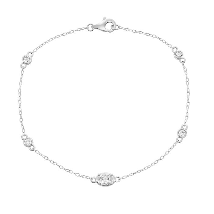 A delicate silver bracelet featuring a fine chain with small, evenly spaced round and oval crystal accents, secured with a lobster clasp.