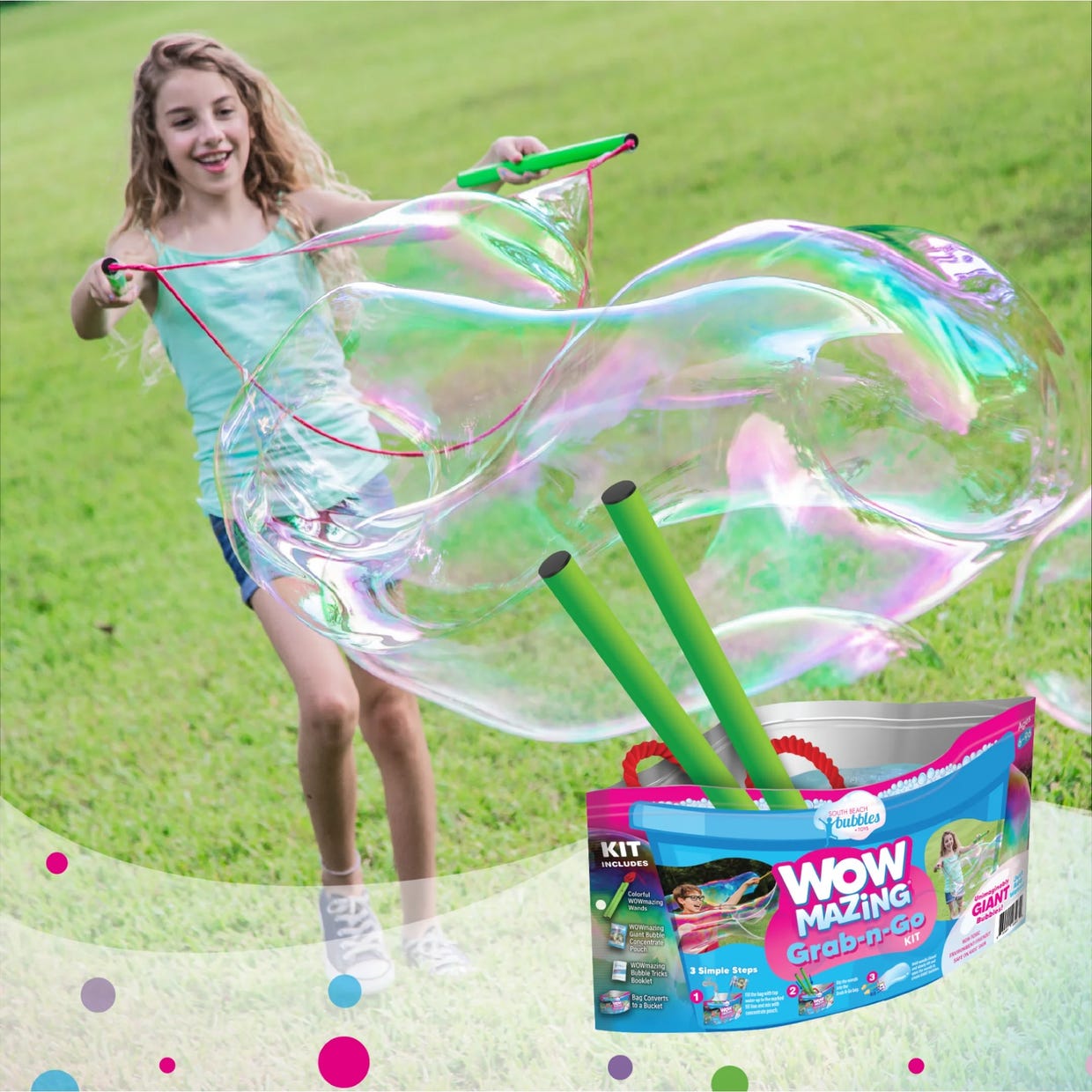A girl playing with a giant bubble creation kit outdoors.