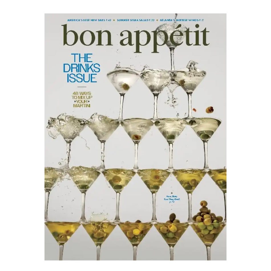 A magazine cover featuring a pyramid of martini glasses with olives, overflowing with liquid. The issue focuses on drinks, specifically martinis, and promises 48 ways to mix them up.