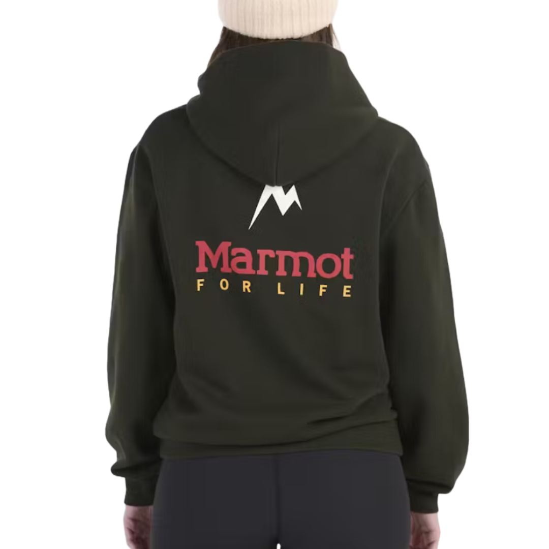 A black hoodie features the text \“Marmot For Life\“ in red and yellow on the back, below a stylized white \“M\“ logo. The wearer has a cream beanie and dark pants.