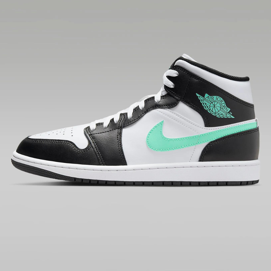 High-top sneaker with black and white panels, featuring a mint green Nike swoosh and Air Jordan logo.