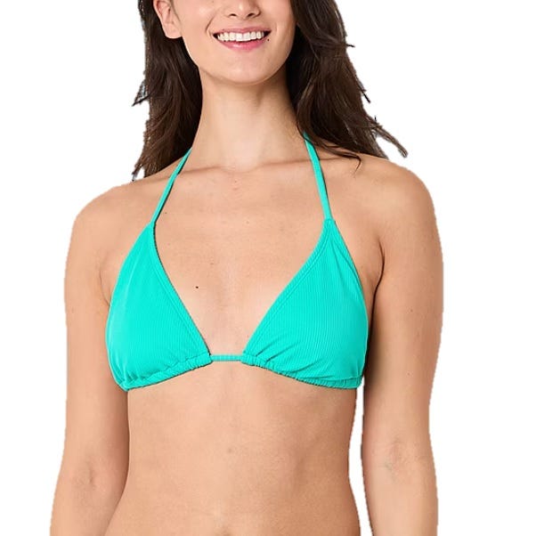 A woman is wearing a turquoise ribbed triangle bikini top with a halter neck style.