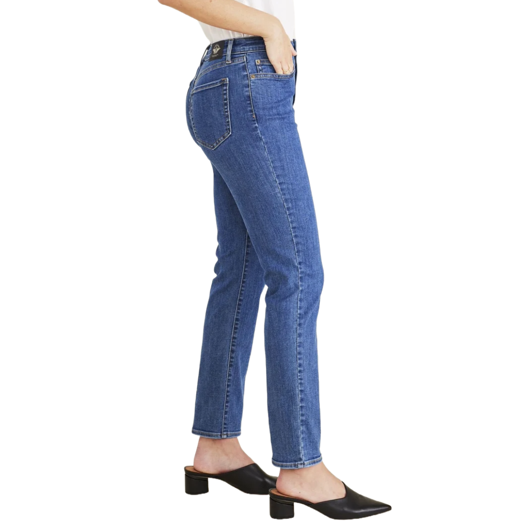 Dockers High Slim Fit Jeans in blue feature a straight leg design with a classic five-pocket style and button closure, paired with black heeled mules.