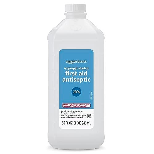 A bottle of Amazon Basics 70% isopropyl alcohol first aid antiseptic, 32 fluid ounces.