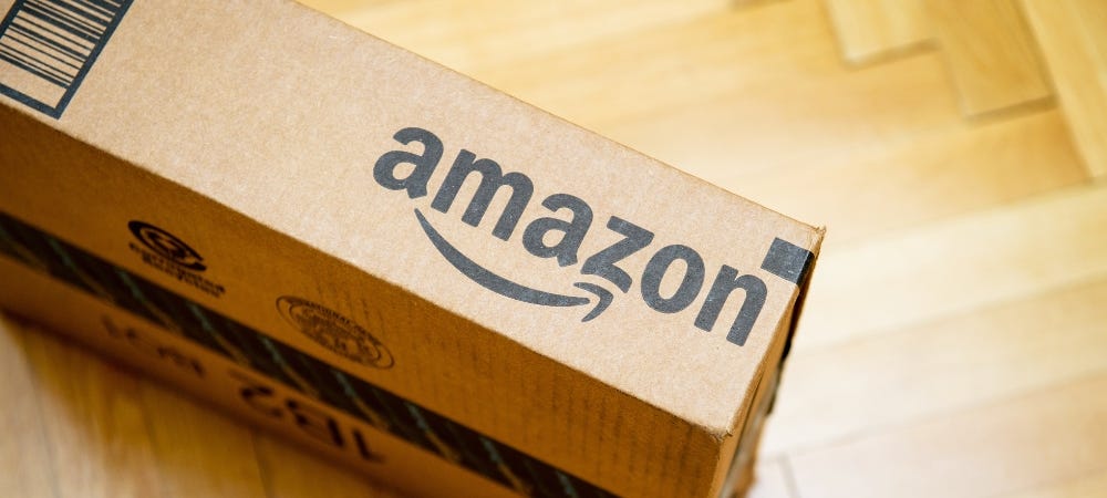 Amazon package on wood floor 