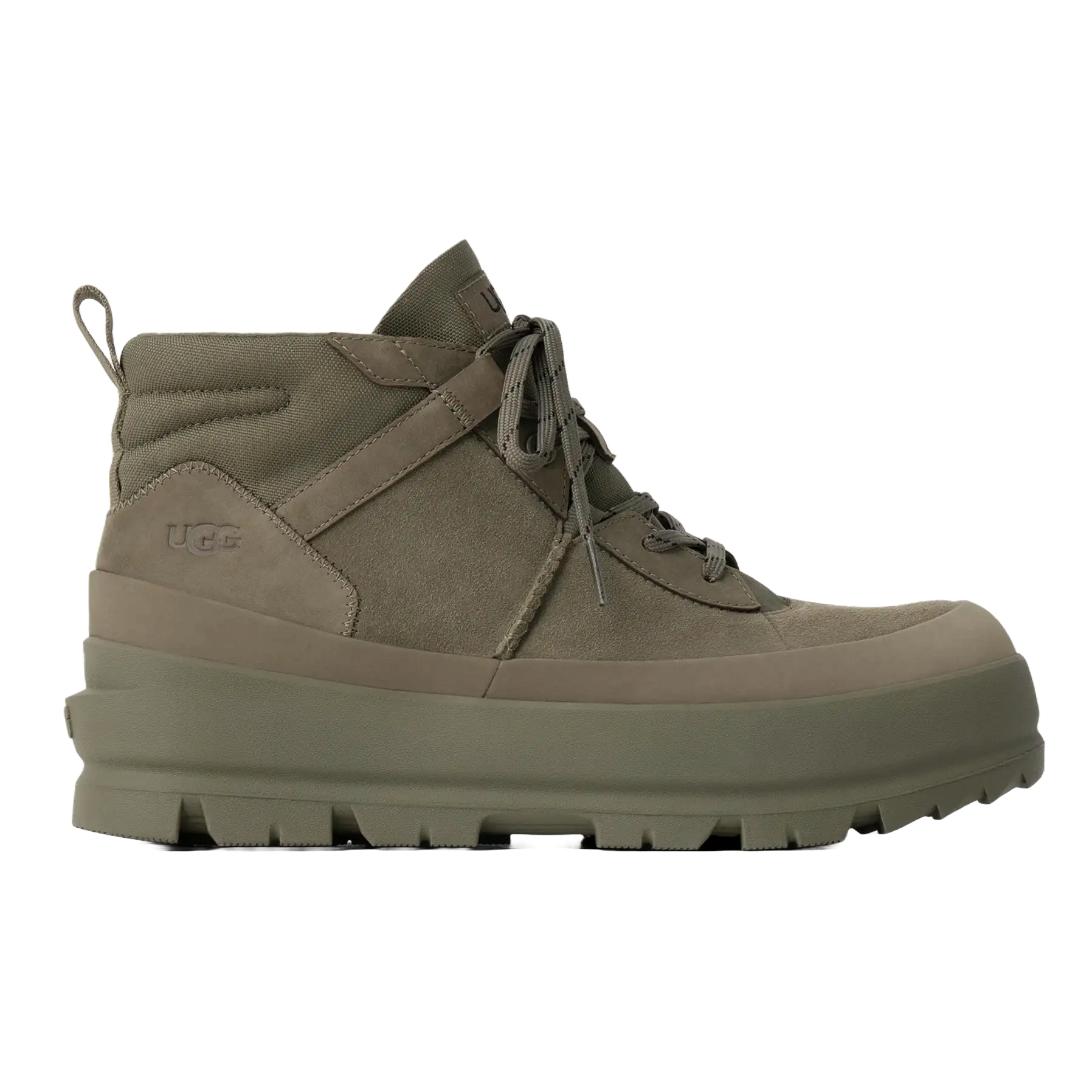 UGG Men's Lug Chukka Boots feature a chunky sole with a mid-height ankle, lace-up closure, and durable materials in a muted green color, providing rugged comfort and style.