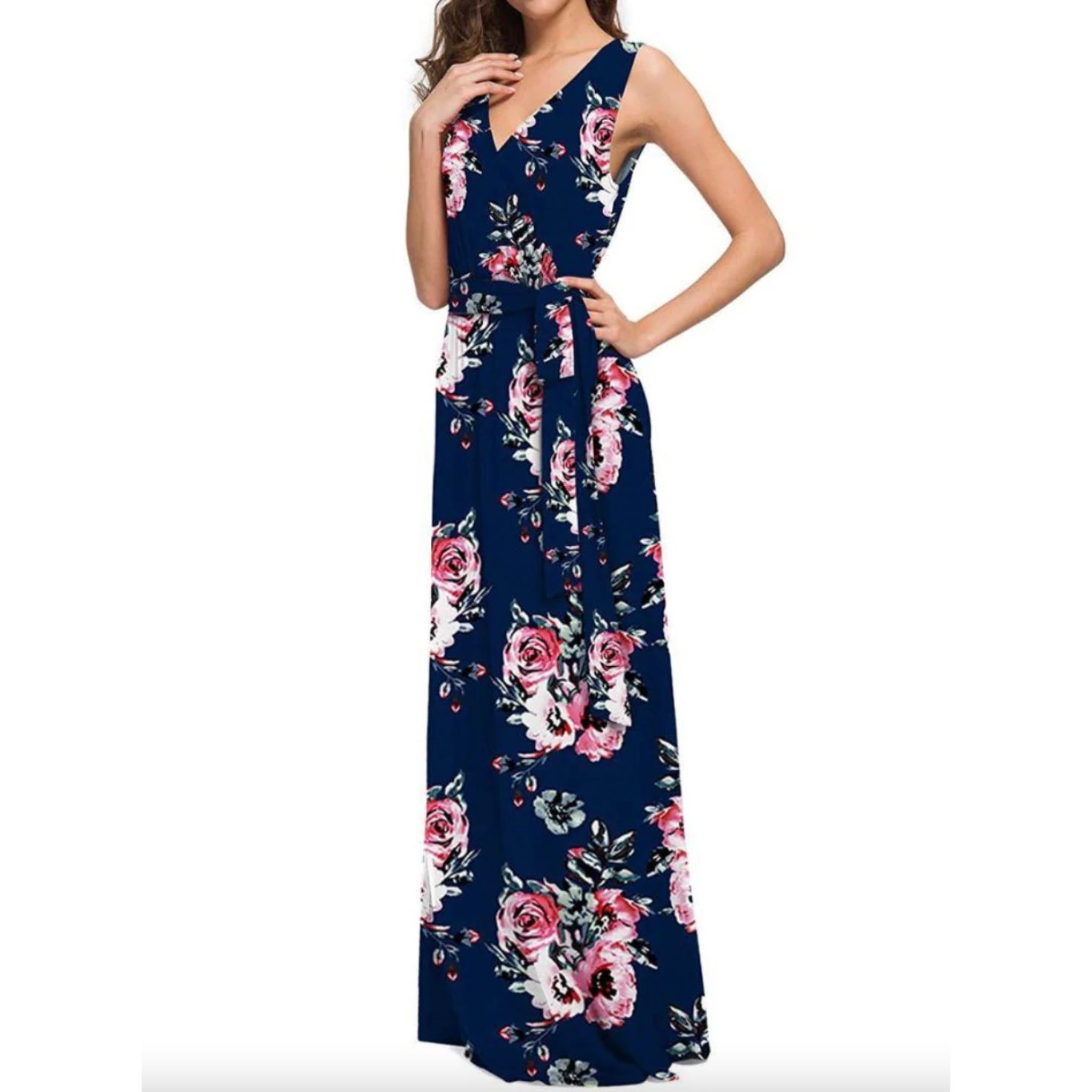 A sleeveless, navy blue maxi dress with a vibrant pink and white floral print and a waist tie.