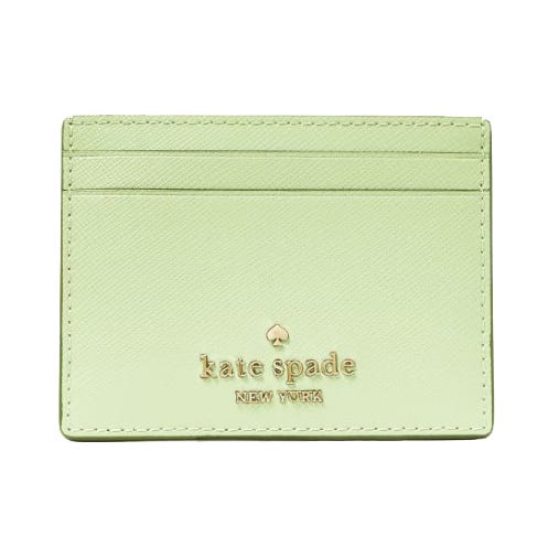 A light green Kate Spade cardholder featuring gold embossed branding and two card slots on the front.