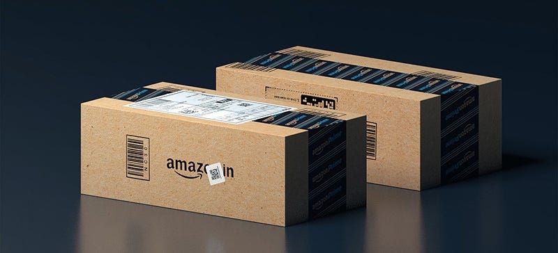Amazon boxes on dark background