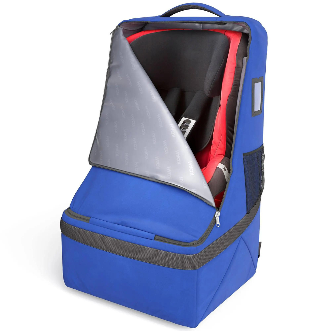 A blue backpack with an open top compartment revealing camera equipment and a lower zippered section.