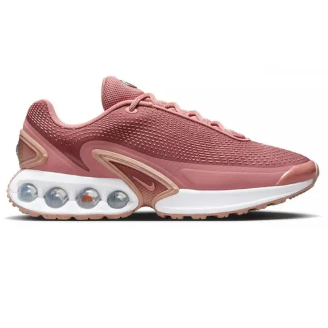 Nike Women's Air Max shoes in rose color, featuring a mesh upper, visible air cushioning in the heel for comfort, and a sleek, sporty design.