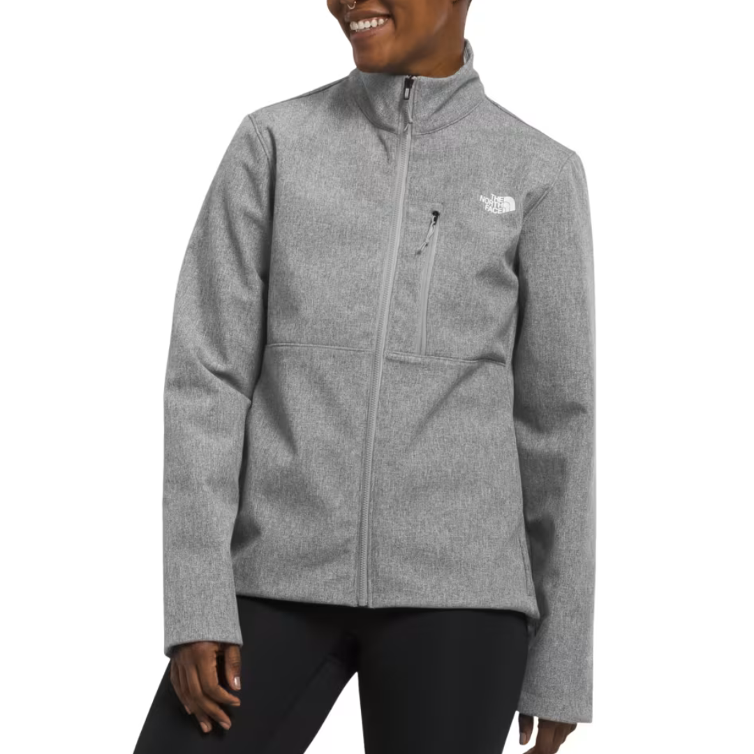 Women's North Face Apex Bionic Jacket features a gray zip-up design with a chest pocket and the white North Face logo on the chest, crafted for versatility and comfort.