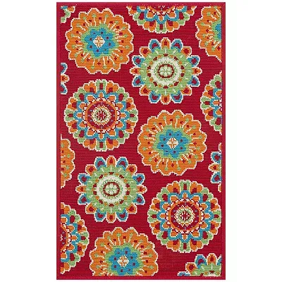 A vibrant 5' x 7' outdoor rug with a red background and colorful medallion patterns in shades of blue, yellow, and white.