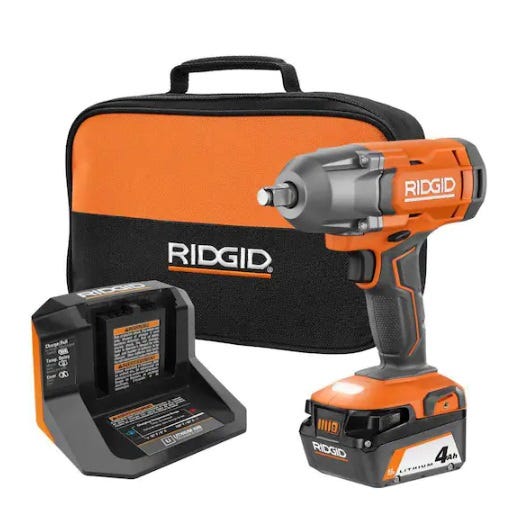 A cordless impact wrench with battery, charger, and carrying case.
