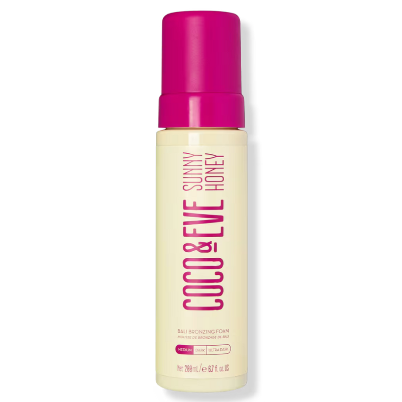 Coco & Eve Sunny Honey Bali Bronzing Foam, 200ml, features a bright pink cap and is designed for medium, dark, and ultra-dark tanning.