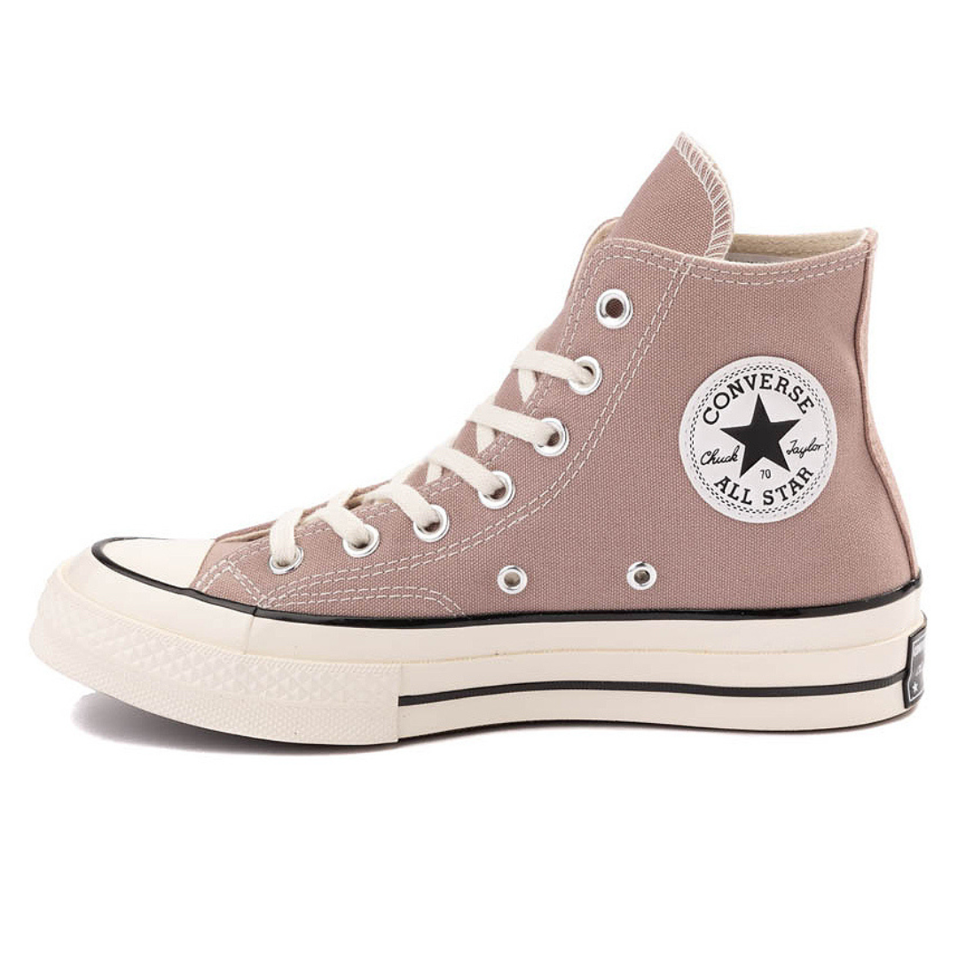 A high-top Converse Chuck Taylor All Star sneaker in a muted pinkish hue with a classic white toe cap and rubber sole, featuring the signature star patch on the side.