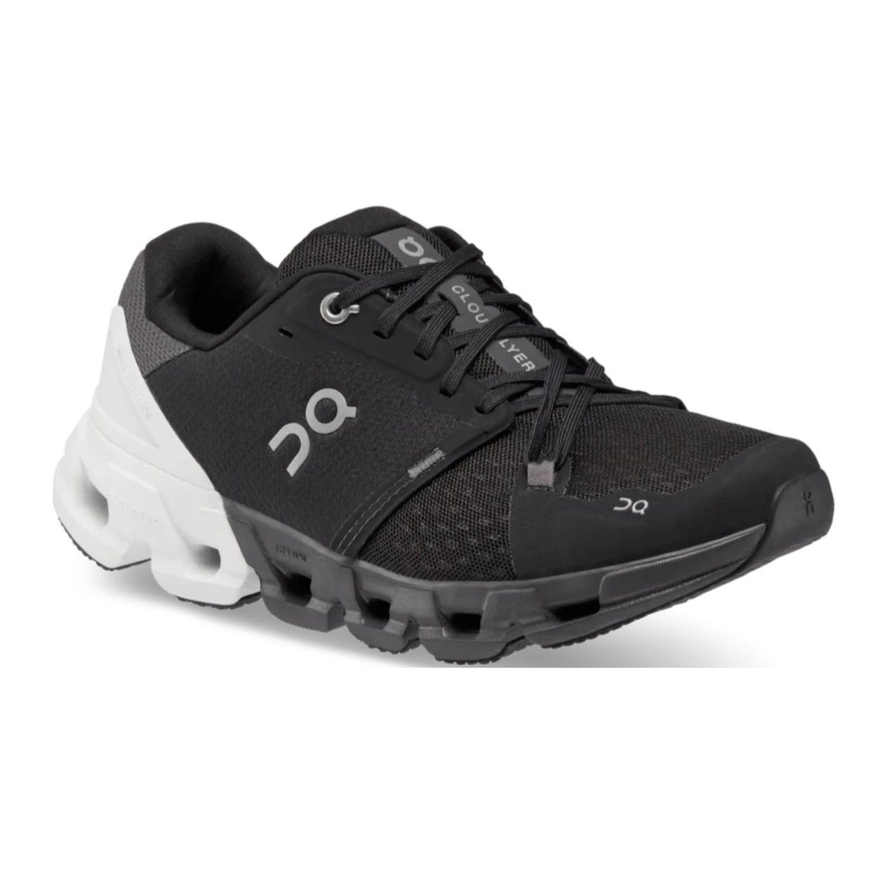 Black and white running shoe with a chunky sole and breathable mesh upper.