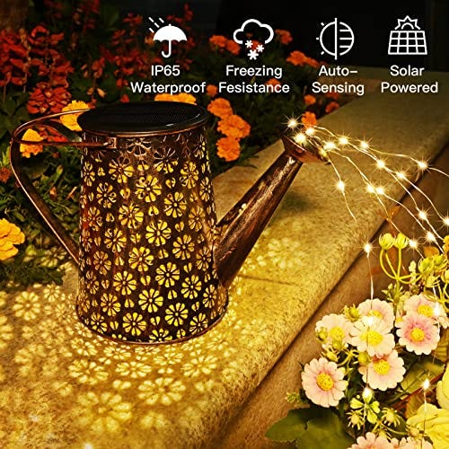 A decorative solar-powered watering can with lights pours a cascade of tiny stars, casting a flower pattern on the ground, and is promoted as waterproof and freeze-resistant.