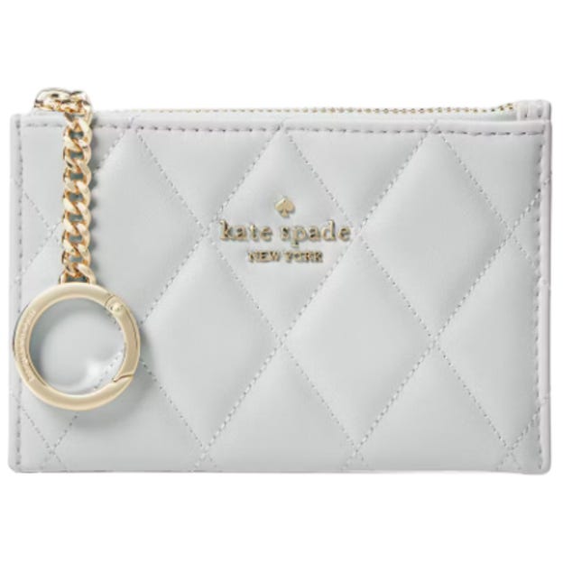 A quilted leather cardholder with a zip closure, gold chain, and keyring, featuring the Kate Spade New York logo in gold.