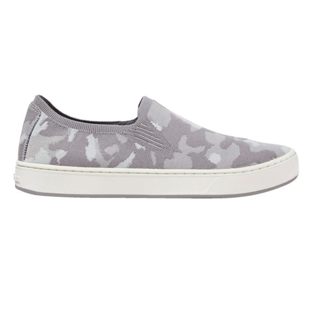 Gray slip-on sneaker featuring a camouflage pattern and a white rubber sole.