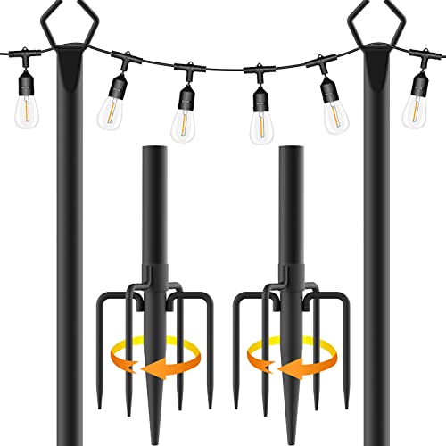 Four black poles with hooks at the top, each featuring an attached string of lights with exposed filaments, and pronged stakes at the base for ground installation.