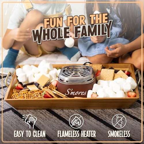A tabletop s'mores maker with a flameless heater sits in a tray surrounded by marshmallows, chocolate, and graham crackers, marketed as a smokeless and easy-to-clean device for family fun.