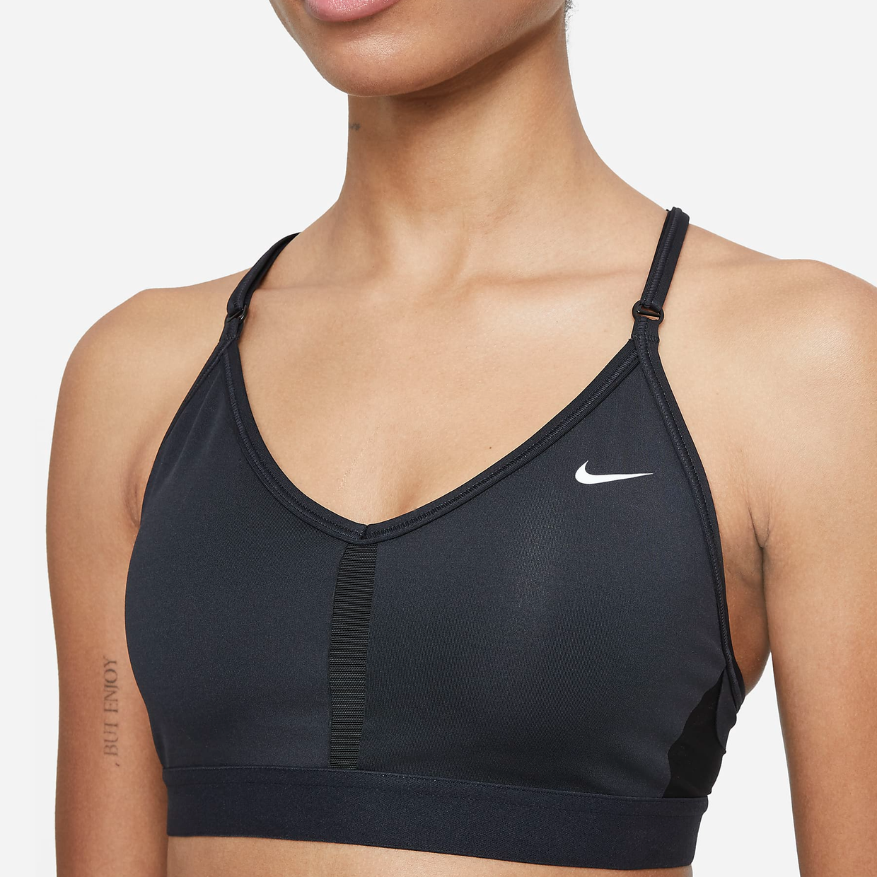 Black Nike sports bra with adjustable straps and white logo on the left side.
