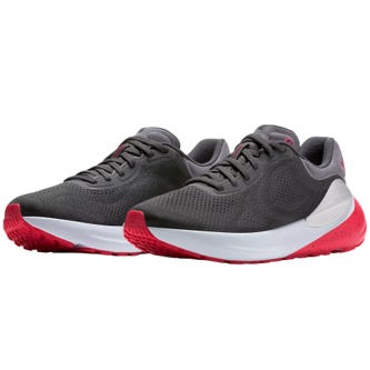 Gray and red athletic shoes with a textured mesh upper, white midsole, and red outsole designed for performance and comfort.