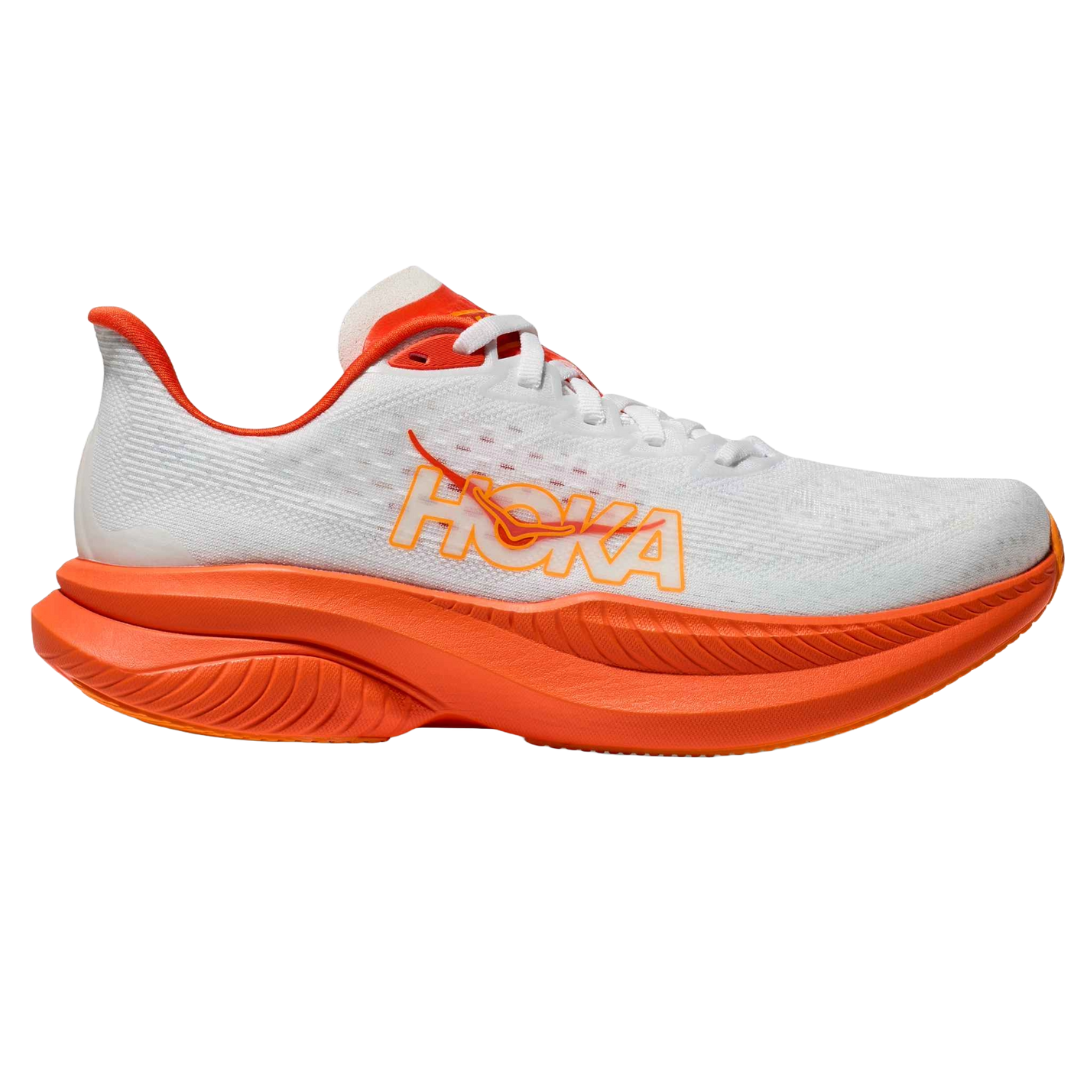 Hoka running shoe in white with orange accents, featuring a thick, cushioned sole and the Hoka logo on the side.
