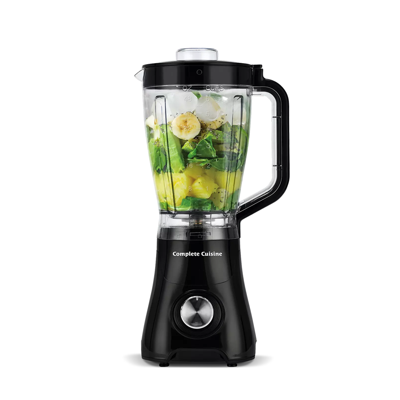 A black blender with a clear jar filled with spinach, banana slices, and other fruits ready to blend.