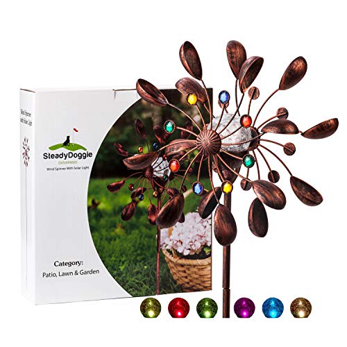 A bronze-colored metal wind spinner with LED solar-powered lights adorns multi-colored glass balls on curved stems.
