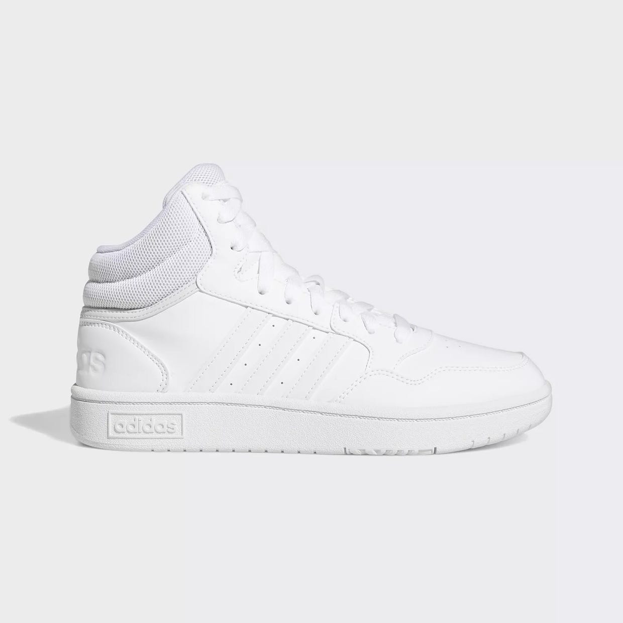White high-top sneaker with laces and perforated detailing on a white sole.