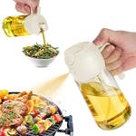 A 2-in-1 oil dispenser with a dual-function lid: one for pouring and the other for spraying, designed for use with salad and grilling.