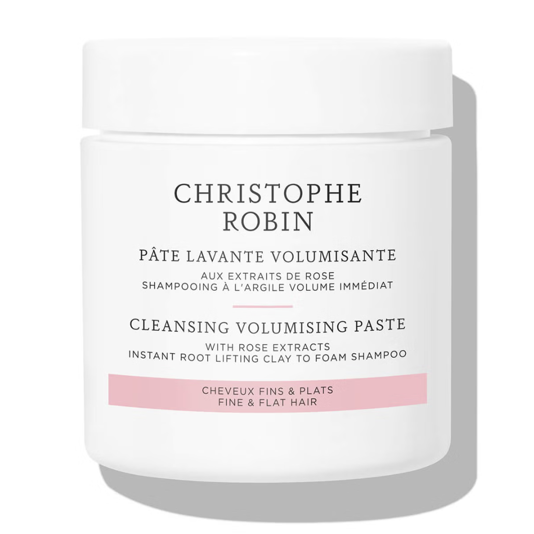 A jar of Christophe Robin cleansing volumizing paste with rose extracts for fine and flat hair.