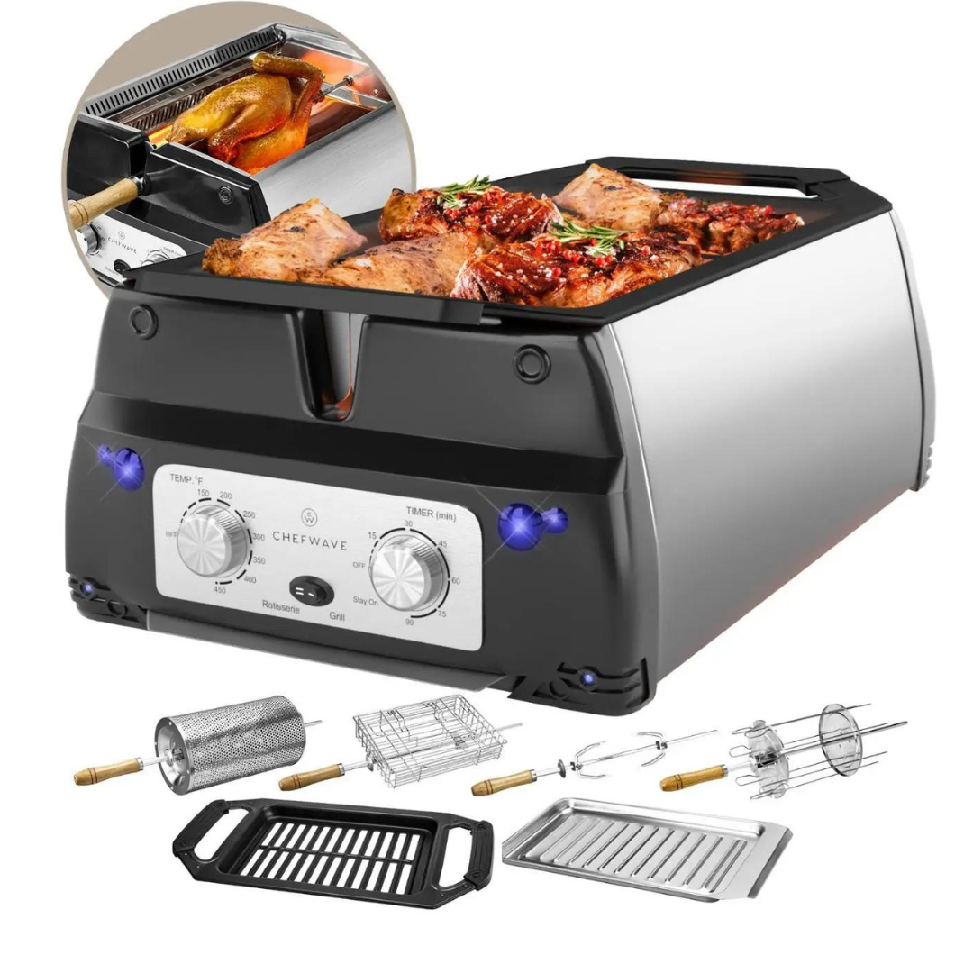 A countertop rotisserie oven with various accessories such as spit rods, a frying basket, grill rack, and a drip tray.
