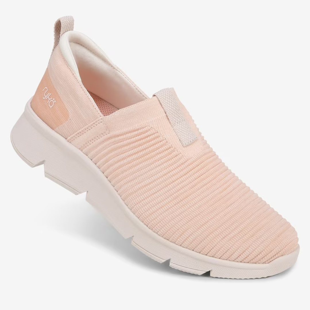 Light pink slip-on sneaker with textured upper and white sole.