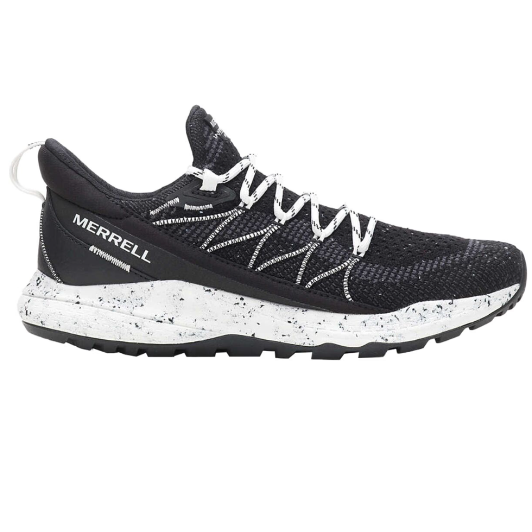 Merrell Bravada 2 Hiking Shoes feature a black knit upper with white speckled midsoles and an aggressive tread for traction. They have a lace-up design and a pull tab on the heel for easy wear, suitable for trail hiking.