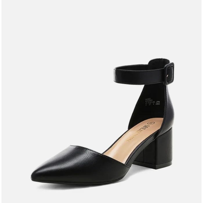 Black ankle strap heel with a pointed toe and chunky heel.