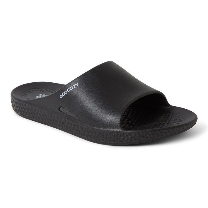 A single black slide sandal with a wide strap and textured sole.