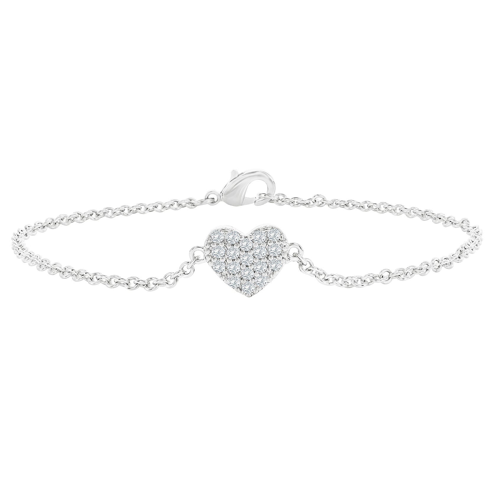 Silver bracelet with a heart-shaped charm encrusted with small sparkling stones, featuring a delicate chain and a lobster clasp.
